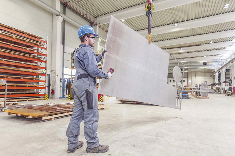 Crane operator with metal sheet