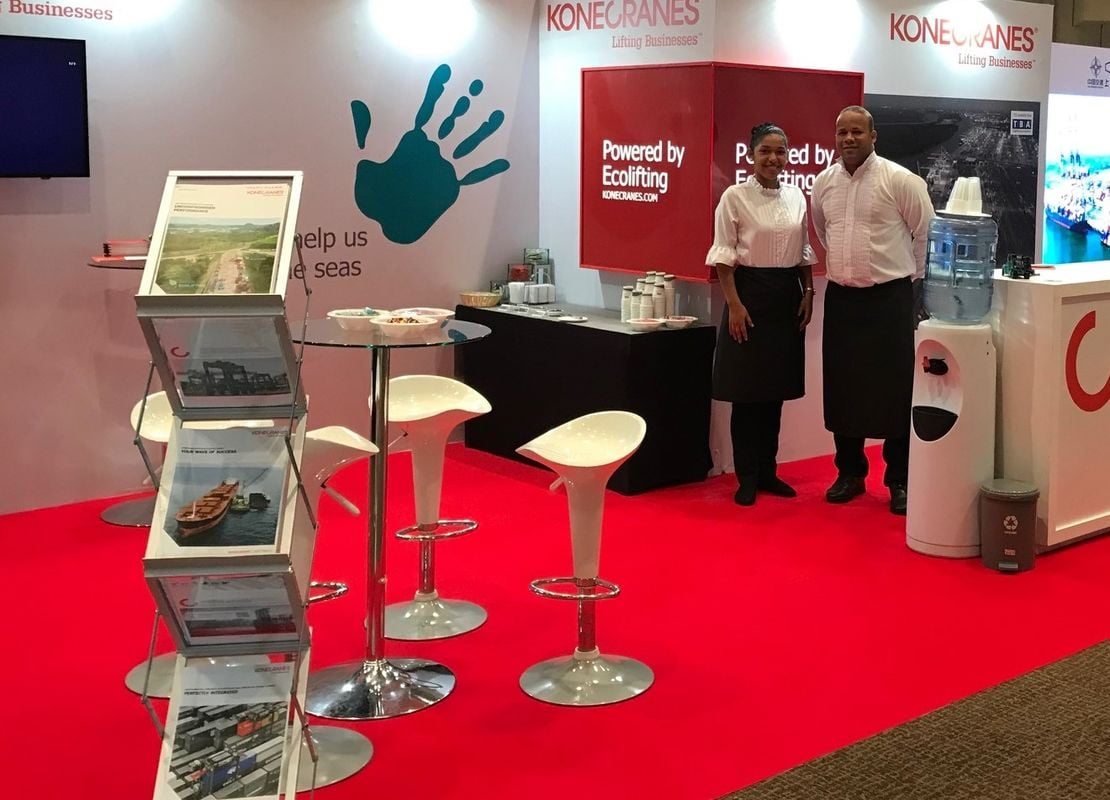 People at Konecranes stand at an expo