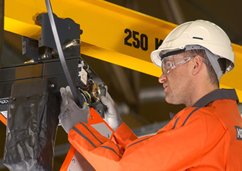 Konecranes technician performs preventive maintenance on chain hoist