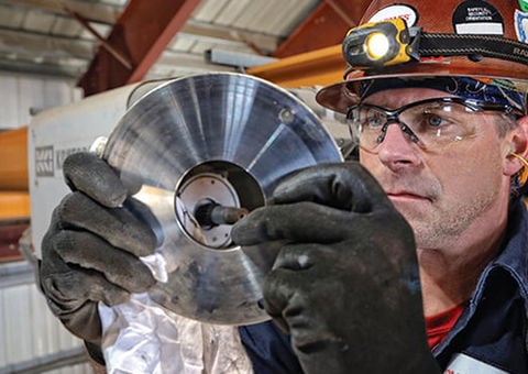 Konecranes technician installs part